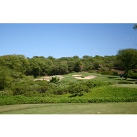 The 11th hole on the Gold Course at Wailea Golf Club is a par 3 over brush. 