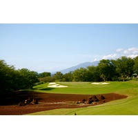 The 16th hole on the Gold Course at Wailea Golf Club is a par 3 that heads back toward the sea and West Maui Mountains. 