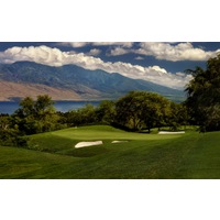 The seventh hole at Makena Golf Course is guarded in front by sand and a small creek. 