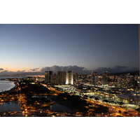 The balconies of the Hawaii Prince Hotel Waikiki serve up the night lights of Honolulu. 